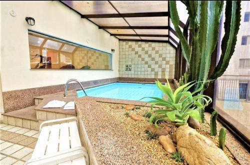 Bazén v ubytování Flat Exclusivo no Itaim Bibi nebo v jeho okolí