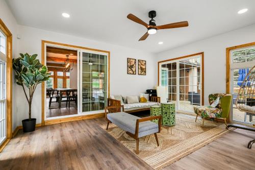 a living room with a ceiling fan and a couch at 226 E Shore Dr in East Stroudsburg