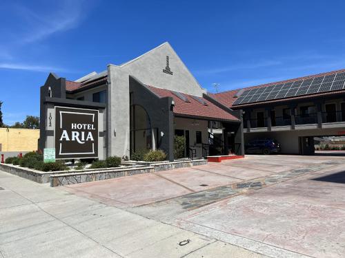 a hotel atlas sign in front of a building at Hotel Aria in Mountain View