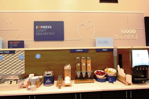 an apple store counter with products on it at Holiday Inn Express Hotel & Suites Hermosa Beach by IHG in Hermosa Beach
