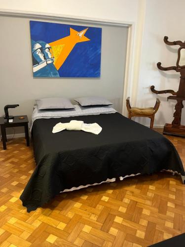 Postel nebo postele na pokoji v ubytování Artist apartment