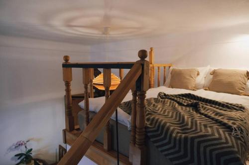 a bedroom with a bed with a zebra blanket at Vista Studio Brasov in the Heart of the Old City Center in Braşov