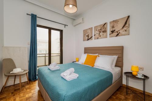 Ένα ή περισσότερα κρεβάτια σε δωμάτιο στο Central apt. with parking - 3 min from old port