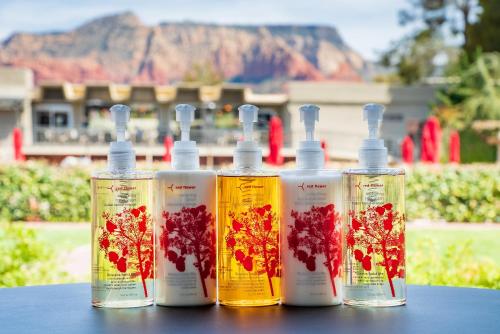 a group of four bottles sitting on a table at Arabella Hotel Sedona in Sedona