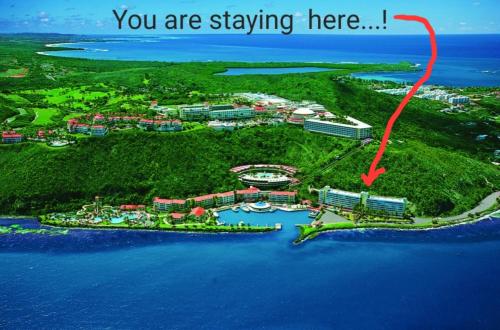 an island with a red arrow that says you are staying here at NAÜTIK, Ocean Front! Great view in Fajardo