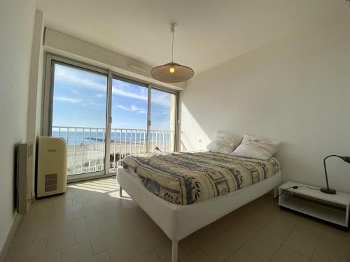 Posteľ alebo postele v izbe v ubytovaní Duplex F3 en bord de plage, 6 couchages, Carnon - Animaux admis, Wifi, parking privé - FR-1-715-19