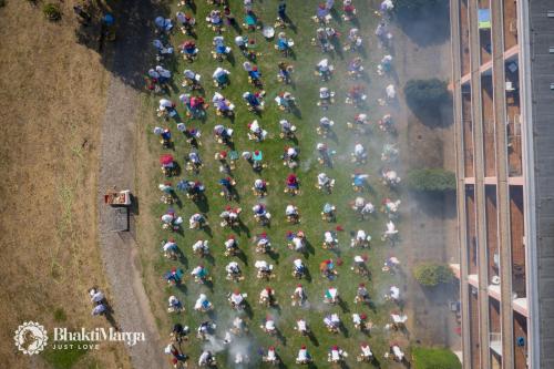 an aerial view of a group of people riding motorcycles at Hindu Monastery - Shree Peetha Nilaya Ashram in Springen