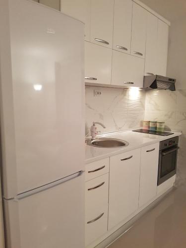 Cuina o zona de cuina de City ​​Apartment