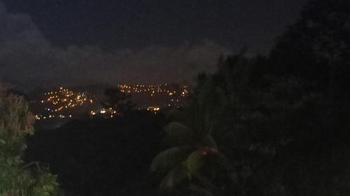 a view of a city at night with lights at Appartement Manou in Le Lamentin