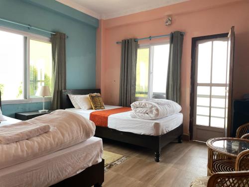 Cama o camas de una habitación en Himalaya Serene View Guest House & Farm Stay