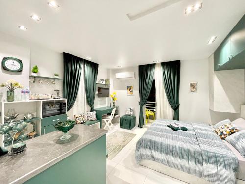 a bedroom with a bed and a living room at Luxury Studio House 589-1 in 6th Of October