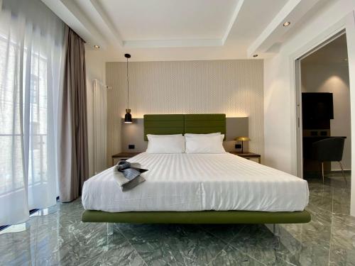Katil atau katil-katil dalam bilik di Salemare Rooms & Suites