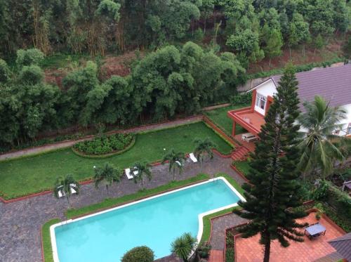 Κήπος έξω από το Dam San Hotel