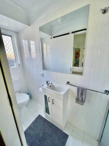Un baño de The Palms Beach House