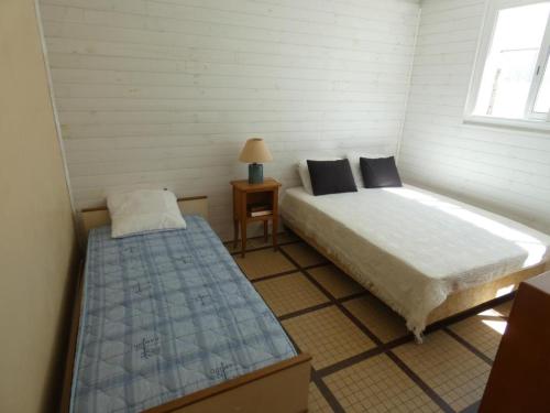 Posteľ alebo postele v izbe v ubytovaní Appartement cosy à 100m de la plage – 5 pers, Équipé, 33m², Parking, Notre-Dame-de-Monts - FR-1-540-239