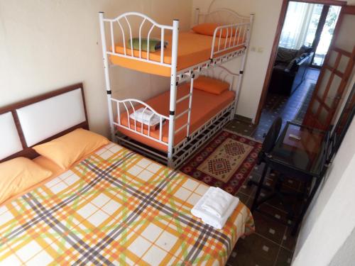 Postel nebo postele na pokoji v ubytování izmir Tatil Evi Beach Resort Seferihisar