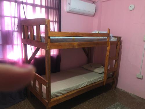 a room with two bunk beds in a room at LP Madriaga Private Apt fully furnished w/Balcony in Ayusan Norte