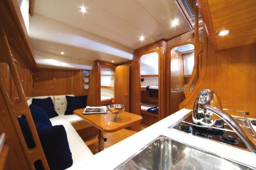a kitchen and living room of a boat at NIGHT ON BOARD in La Maddalena
