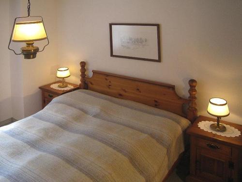 Postel nebo postele na pokoji v ubytování Casa Laghetto 5