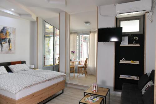 En eller flere senger på et rom på Apartman Time out 1