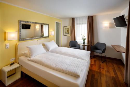 Μια τηλεόραση ή/και κέντρο ψυχαγωγίας στο Aparthotel Familie Hugenschmidt