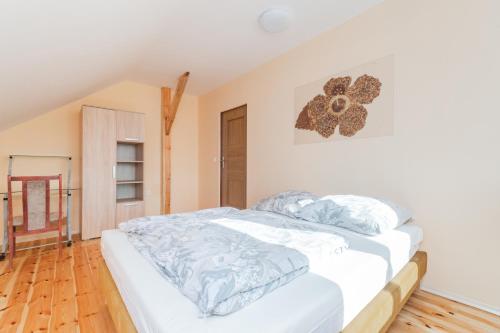 Säng eller sängar i ett rum på Apartamenty Horyzont Marzeń