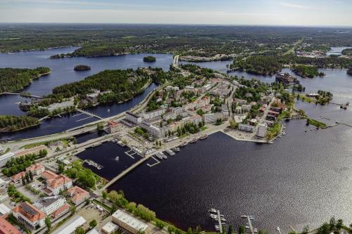 an aerial view of a city and a river at Summer Hotel Tott in Savonlinna