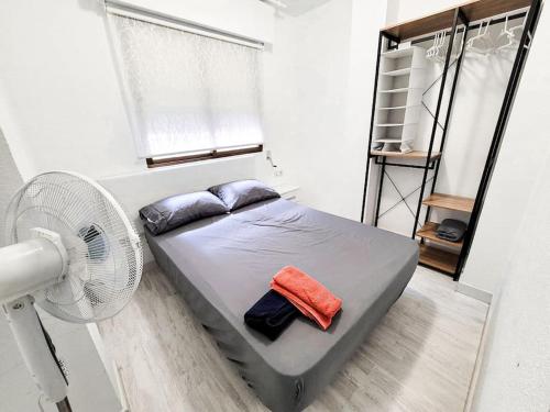 Una cama o camas en una habitación de SG- Precioso apartamento junto a la plaza Las Flores