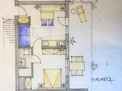 a sketch of the front elevation of a house at Landhaus Almdorf in Sankt Johann in Tirol