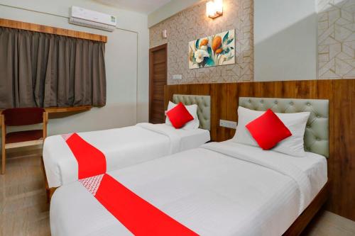 Ένα ή περισσότερα κρεβάτια σε δωμάτιο στο Collection O Global Stay Near Kengeri Bus Terminal Metro Station