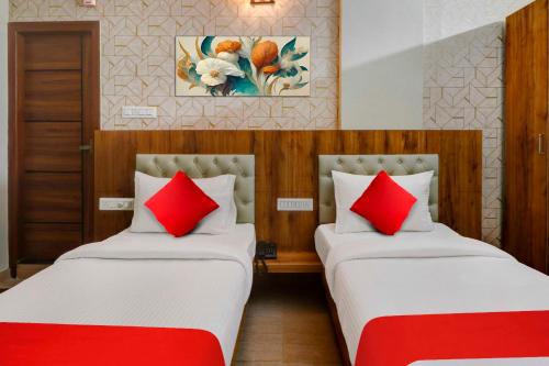 Ένα ή περισσότερα κρεβάτια σε δωμάτιο στο Collection O Global Stay Near Kengeri Bus Terminal Metro Station