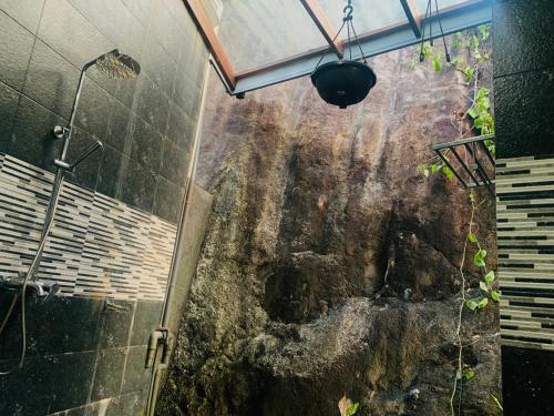 a view of a shower in a bathroom at Jungle city Hostel in Galle