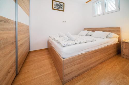 Postel nebo postele na pokoji v ubytování ARA-BANE