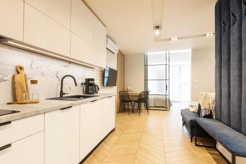 Virtuvė arba virtuvėlė apgyvendinimo įstaigoje Apartment Antalovka Residence & Spa