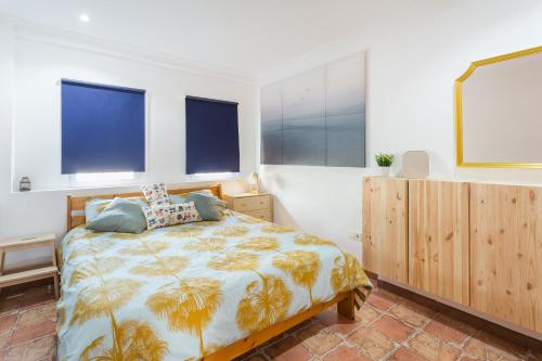 Posteľ alebo postele v izbe v ubytovaní Ático Jávea Puerto