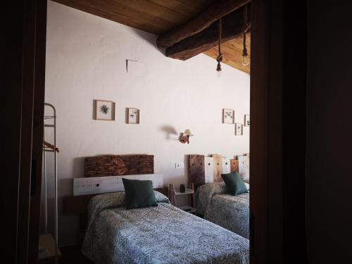 Cama o camas de una habitación en Casa Rural El Llano Quintanilla