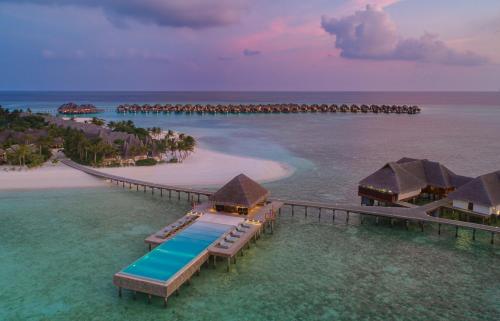 an aerial view of a resort in the ocean at Heritance Aarah - Premium All Inclusive - 40 Minutes away from Male by Seaplane in Raa Atoll