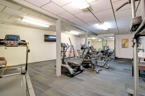 a gym with treadmills and cardio equipment in a building at Quality Inn & Suites in Lincoln