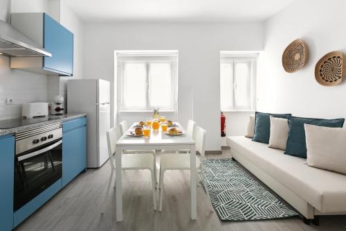 Køkken eller tekøkken på Rose Breeze Apartment