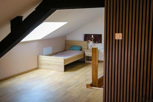 Cama o camas de una habitación en Gîte de la Ravanne