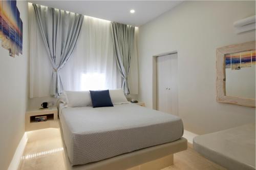 Postel nebo postele na pokoji v ubytování Soultouch Beachfront Villa