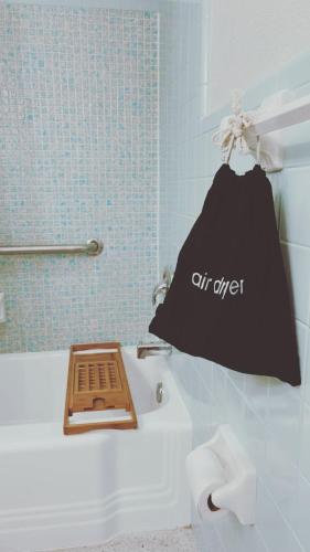 a black bag sitting on top of a bath tub at Florida Mango Island /pool/beach/Legacy Trail in Venice