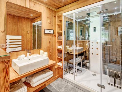 a bathroom with a sink and a shower at Chalet Morzine, 6 pièces, 13 personnes - FR-1-627-8 in Morzine