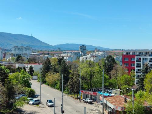 a view of a city with buildings and a street at Mladost 1 Apartment near the metro in Sofia