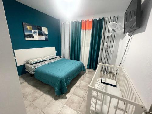 Een bed of bedden in een kamer bij Vientos Alisios