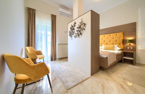 Posteľ alebo postele v izbe v ubytovaní Villa PIANO