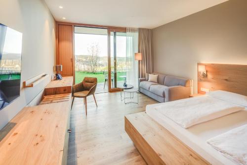 Postel nebo postele na pokoji v ubytování Hotel Munde