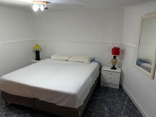 Posteľ alebo postele v izbe v ubytovaní CLAUDIA Puertito de Adeje - 2 bedrooms, 70mq, on the beach