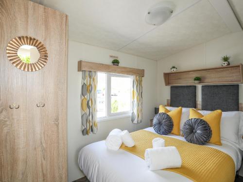 Katil atau katil-katil dalam bilik di Caban Cwtch The Cosy Cabin