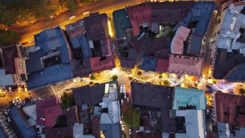 an overhead view of a city at night at Friendly Hotel in Tbilisi City